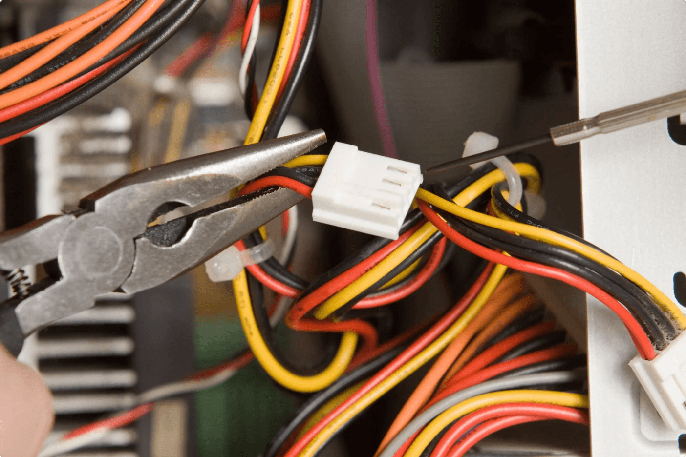 Image of Pliers Holding Electrical Quick Connector